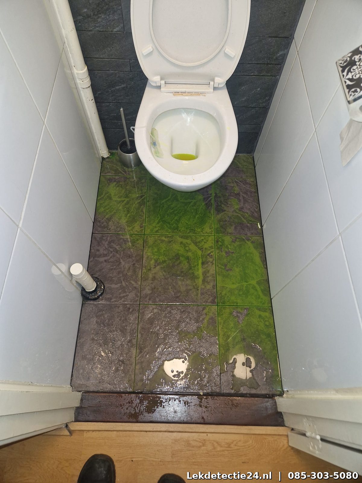Overstroming in toilet door rioollekkage